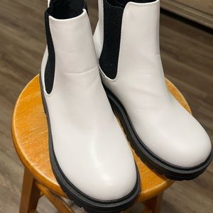 White soda, stylish boots, and size 8 1/2 they do run a bit small